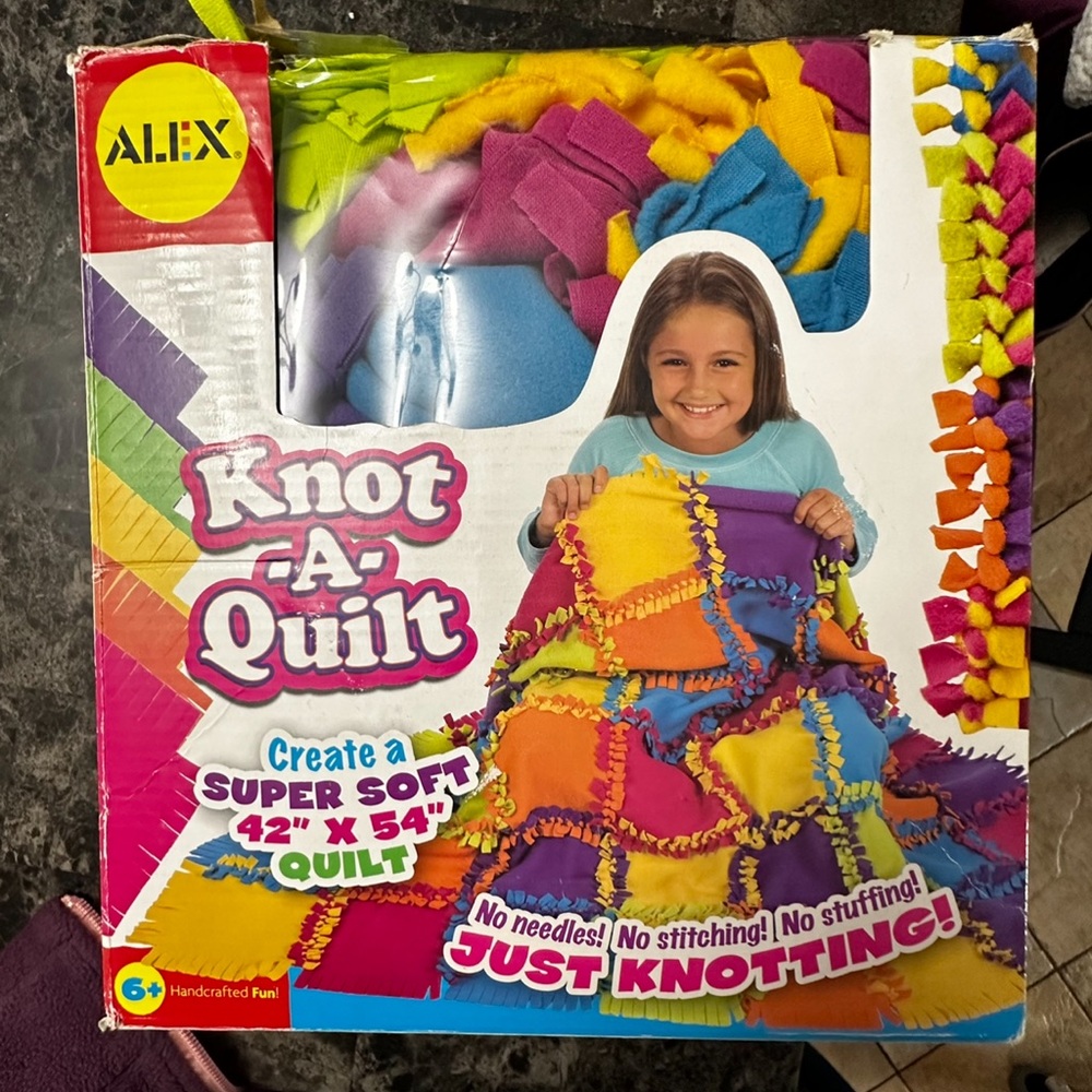 The Alex DIY Knot-A-Quilt kit ages 6 and up, finished quilt measures 42" x 54"